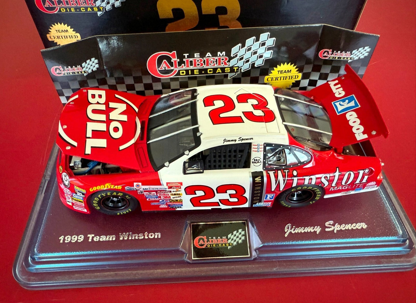 TEAM CALIBER. 1999 FORD TAURUS. TEAM WINSTON JIMMY S. 1/24 SCALE. (1 OF 5004)