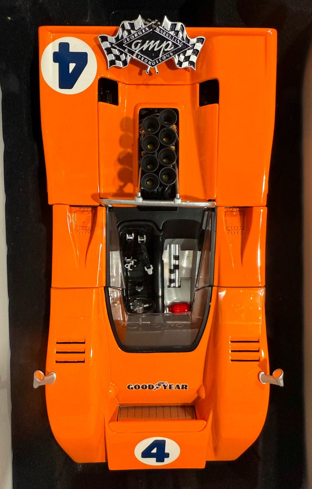 GMP. 12024. BRUCE McLAREN. 1969 CHAMPION McLAREN M8B HIGH WING. 1/18 SCALE.