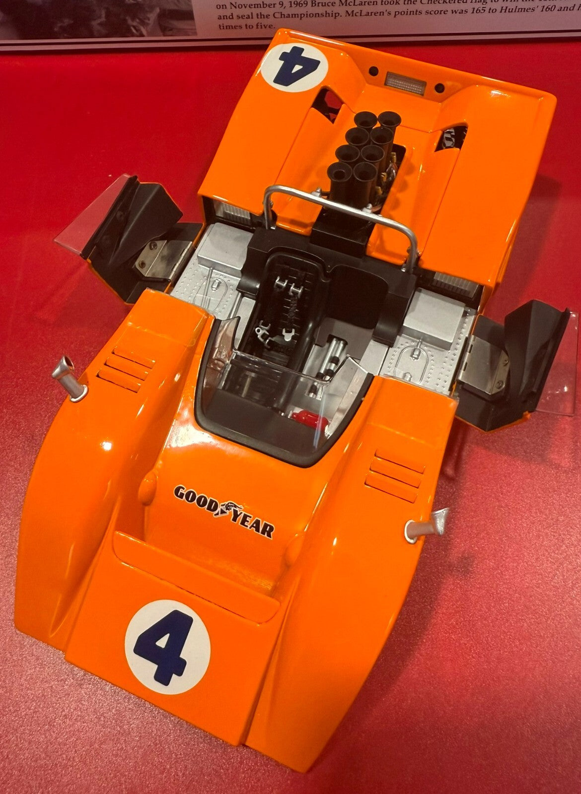 GMP. 12024. BRUCE McLAREN. 1969 CHAMPION McLAREN M8B HIGH WING. 1/18 SCALE.