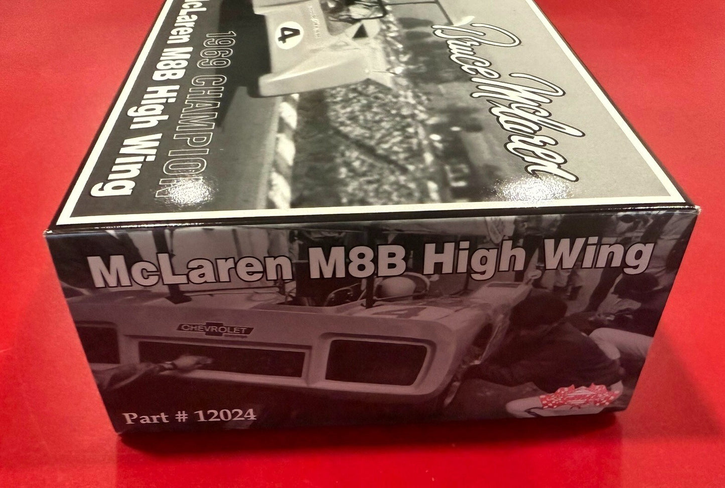 GMP. 12024. BRUCE McLAREN. 1969 CHAMPION McLAREN M8B HIGH WING. 1/18 SCALE.