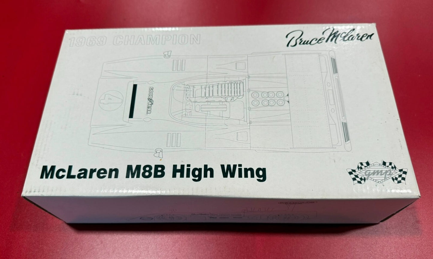 GMP. 12024. BRUCE McLAREN. 1969 CHAMPION McLAREN M8B HIGH WING. 1/18 SCALE.