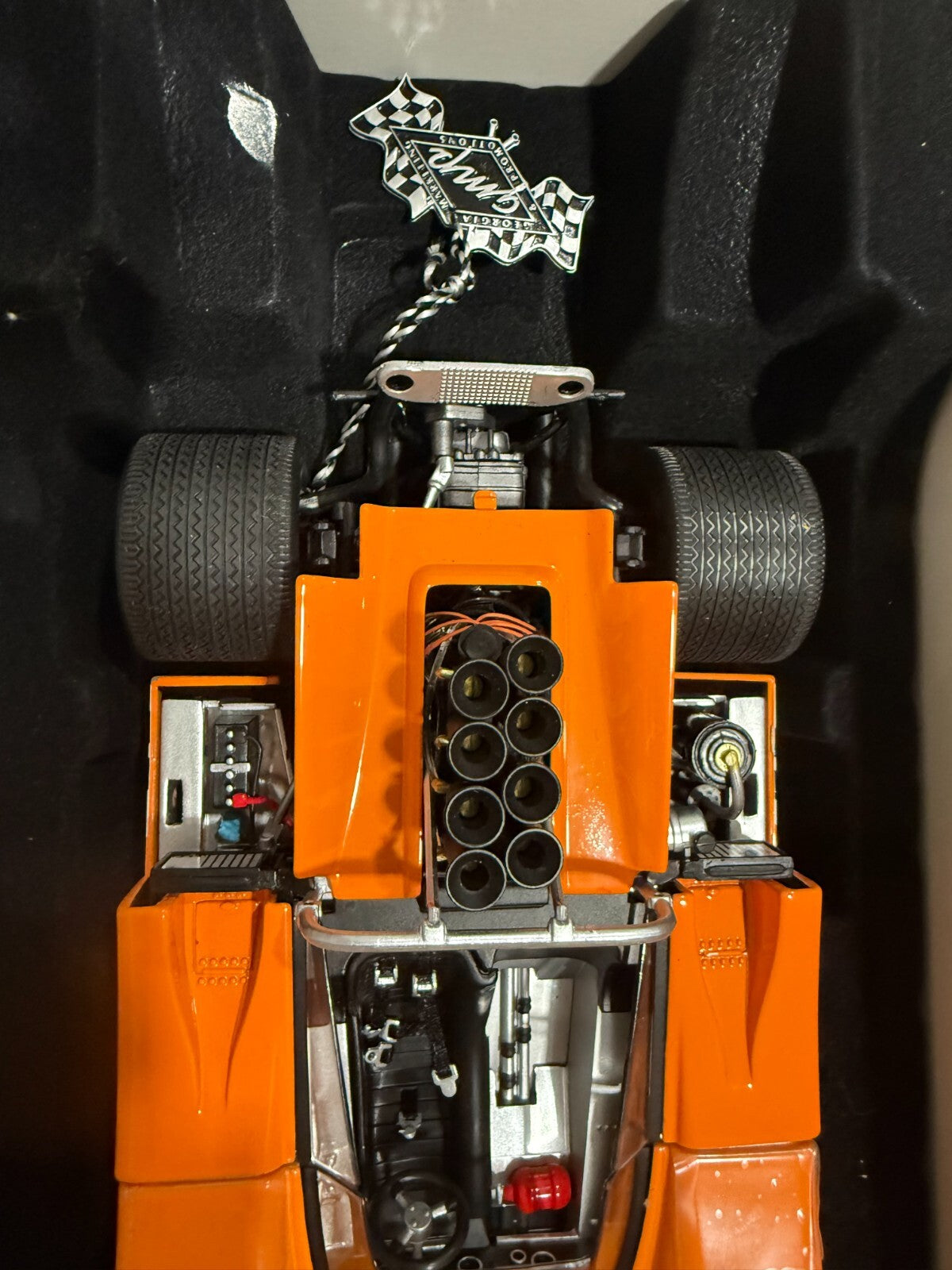 GMP. 12024. BRUCE McLAREN. 1969 CHAMPION McLAREN M8B HIGH WING. 1/18 SCALE.