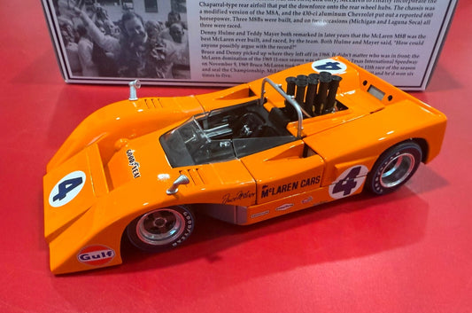GMP. 12024. BRUCE McLAREN. 1969 CHAMPION McLAREN M8B HIGH WING. 1/18 SCALE.