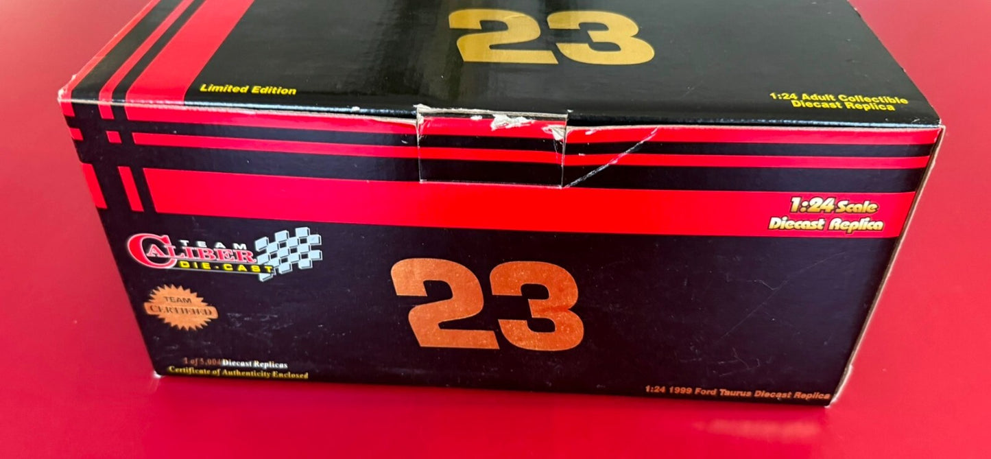 TEAM CALIBER. 1999 FORD TAURUS. TEAM WINSTON JIMMY S. 1/24 SCALE. (1 OF 5004)