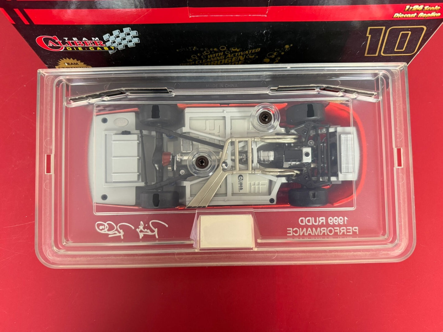 TEAM CALIBER. 2910057. 1999 FORD TAURUS DIECAST REPLICA. 1/24 SCALE.