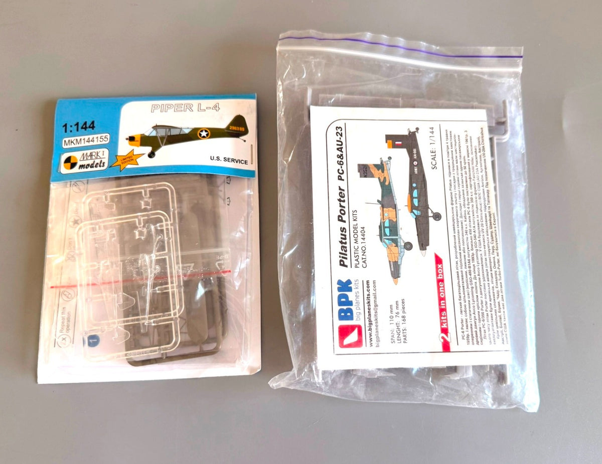 Lot of 2 Aircraft Model Kits 1/144 Piper L-4 & Pilatus Porter PC-6/AU-23