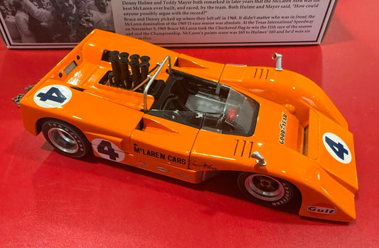 GMP. 12024. BRUCE McLAREN. 1969 CHAMPION McLAREN M8B HIGH WING. 1/18 SCALE.