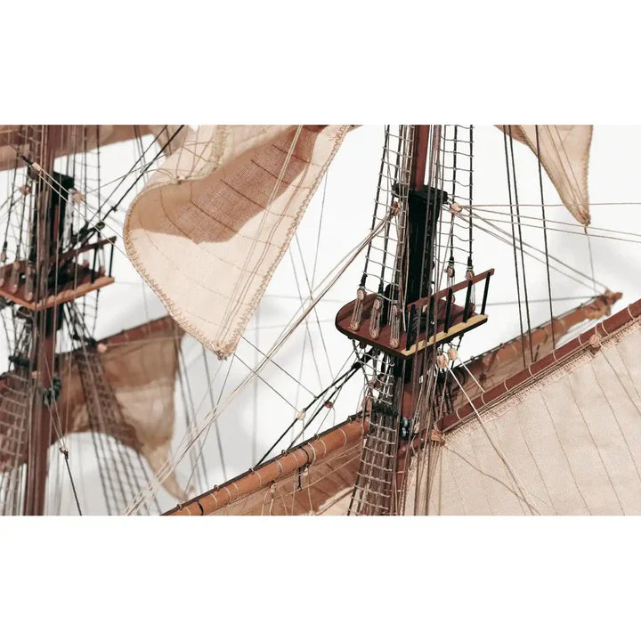 Close-up of OcCre Corsair model ship masts, sails, ropes, and rigging