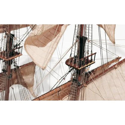 Close-up of OcCre Corsair model ship masts, sails, ropes, and rigging