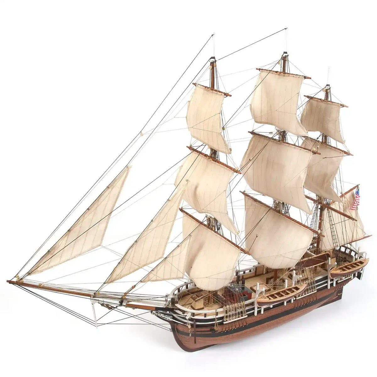 Three-quarter view of the completed OcCre Essex 12006 wooden whaleship model featuring traditional sailing rig, wooden hull and detailed deck structures.