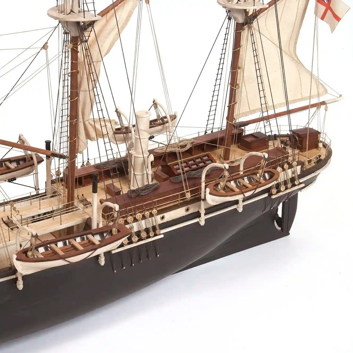 Detailed side view of the OcCre HMS Endurance 1:70 wooden ship model highlighting the black hull, wooden deck, lifeboats, railings, and rigging.